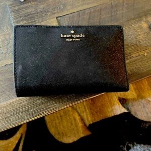 Kate spade black glitter wallet.